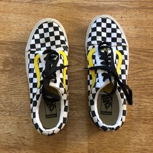 Checkered vans with yellow stripe